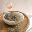 Thread Office Ceramic Shell Decorative Bowl on a side table with a glass of wine