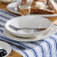 Mikasa Navy Striped Table Runner, 230cm on the table with a dinner set