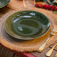 Mikasa Brown Round Hessian Placemats, Set of 4 with a plate