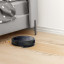 Eufy G50 Hybrid Robot Vacuum Cleaner on laminated flooring in the bedroom