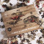 Pikkii T-Rex Layer Puzzle, 360-Piece on the table