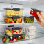 Sistema Brilliance Small Rectangular Container, 380ml with other containers in the fridge 