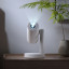 Etoe Starfish Google Certified 4K Android Smart TV Projector on a nightstand