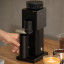 Timemore Bricks 01s Electric Coffee Grinder with a cup of coffee