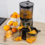 OmniBlend OmniJuice Cold Press Juicer with orange juice