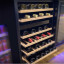 SnoMaster 46 Bottle Pro Series Dual Zone Wine Cooler with wine bottles