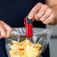 KitchenAid Kitchen Clips, Set of 4 on a packet of chips