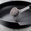 KitchenAid Cast Iron Cleaner Brush on a pan