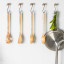 KitchenAid Birchwood Pasta Server & Fork hung on the kitchen hanger