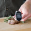 KitchenAid Instant-Read Pivoting Digital Thermometer measuring meat temperature 