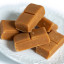 Rose's Delicacies Large Vanilla Fudge Bar, 160g detail on a side plate