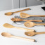 KitchenAid Birchwood Basting Spoon on the kitchen counter
