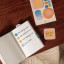 Papier Vibrance Sticky Note Set on a notebook with notes