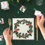 Talking Tables Botanical Christmas Trivia Game on the dinner table