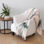 Linen House Willow Embrace Throw, 140cm x 180cm on a couch