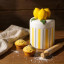 Nicolson Russell Lemon Citrus Canister on the table with cupcakes