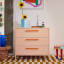 Popstrukt Sprinkles Chest of Drawers - Peach Pop with sunflowers in a vase