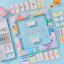 WS Games Aura Glass Edition Monopoly on the table