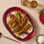 Le Creuset Coupe Serving Platter, 43cm - Cerise with veg