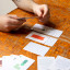 Suck UK Mello Solo Playing Cards on the table