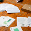 Suck UK Mello Solo Playing Cards on the table
