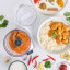 Cuisinart Pixie Chopper Mini Food Processor, 700ml on counter with ingredients 
