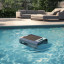 Aiper Surfer S2 Cordless Solar Robotic Skimmer in a pool