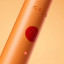 Ordo Sonic Edge Rechargeable Toothbrush - Peach Sunrise  on/off button close up