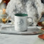 Le Creuset Zodiac Seattle Mug, 400ml - Aries on the table