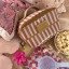 Thandana Laminated Fabric Side Mouth Vanity Bag - Indie Sunset
