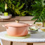 Le Creuset Peche Signature 6.3 Litre Oval Cast Iron Casserole, 31cm on the table