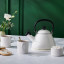 Le Creuset Kone Whistling Stovetop Kettle, 1.6L white with tea and sugar