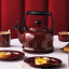 Le Creuset Traditional Whistling Stovetop Kettle, 2.1L - Rhone on the table