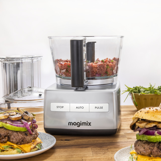 Magimix Compact 1100W Food Processor, 5200XL - Satin on the table