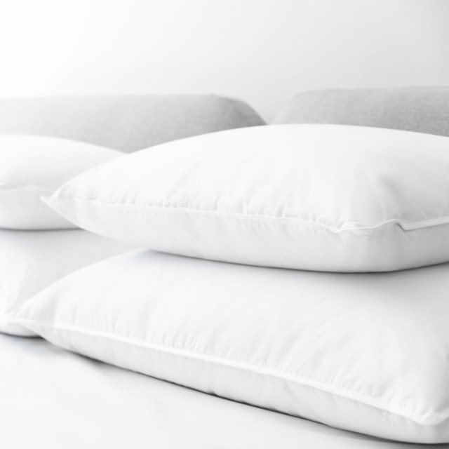 Royal Comfort Duck Down Pillow, 50% Down - Standard on the bed