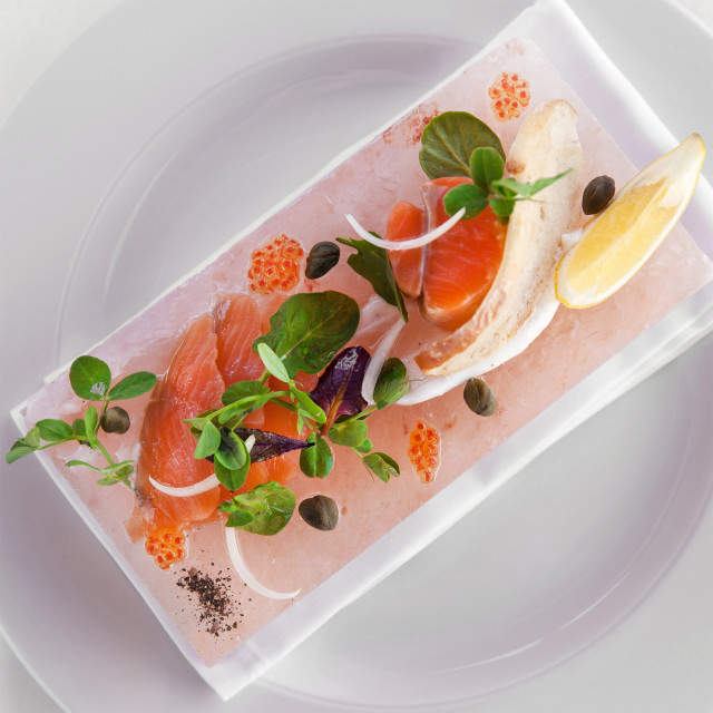Jimmy Public Salt Slab with salmon and other ingredients