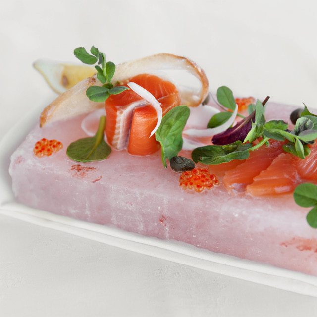 Jimmy Public Salt Slab with salmon and other ingredients
