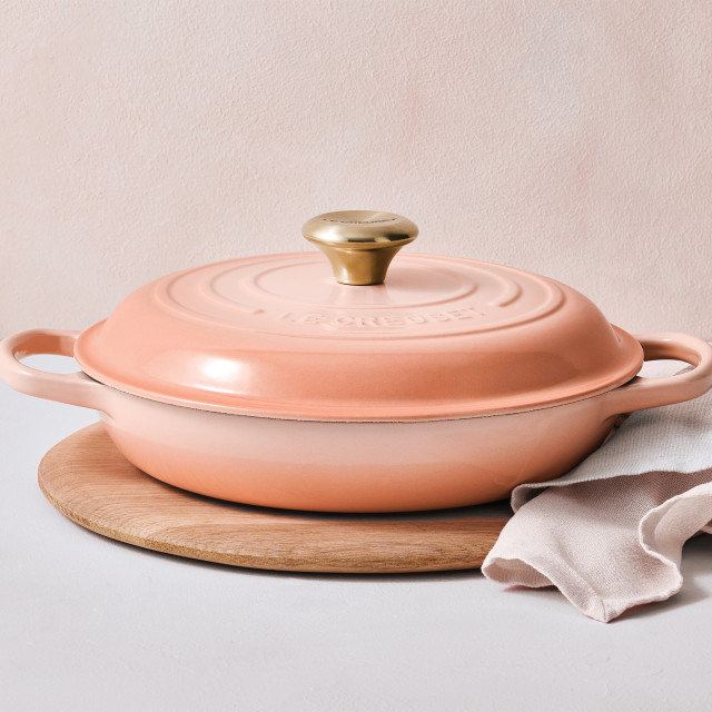 Le Creuset Peche Signature 3.5 Litre Shallow Casserole, 30cm on the table