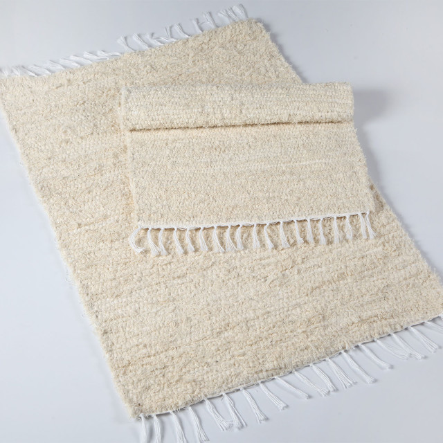 Barrydale Hand Weavers Bath Mat on the floor