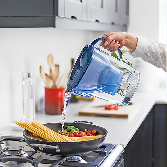 Brita Marella Cool Blue Water Filter Jug, 2.4L pouring water in a pan
