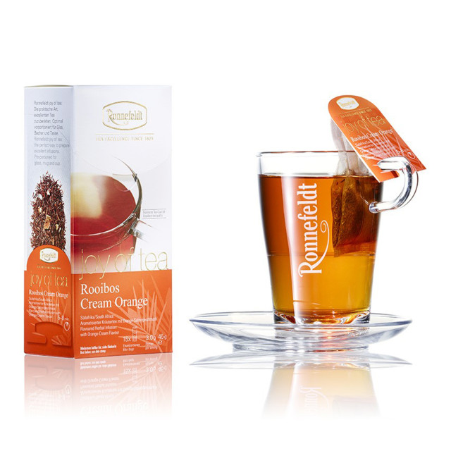 Ronnefeldt Joy of Tea Rooibos Cream Orange Tea Bags, Box of 15 with a cup of tea