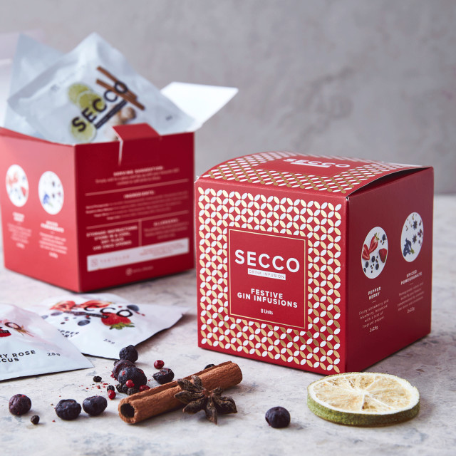Secco Festive Gin Infusions, Pack of 8 on the table
