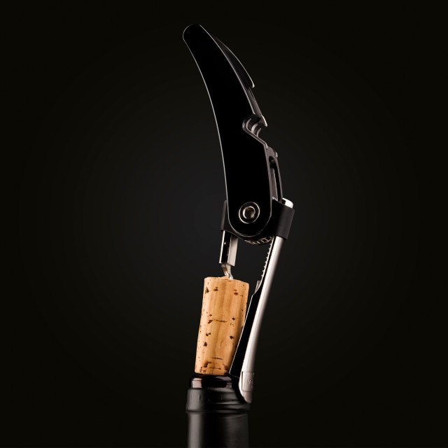Vacu Vin Single Pull Corkscrew with a bottle of wine