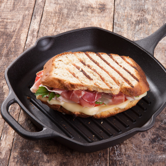 Victoria Seasoned Cast Iron Grill Pan with Helper Handle, 26cm with a sandwich