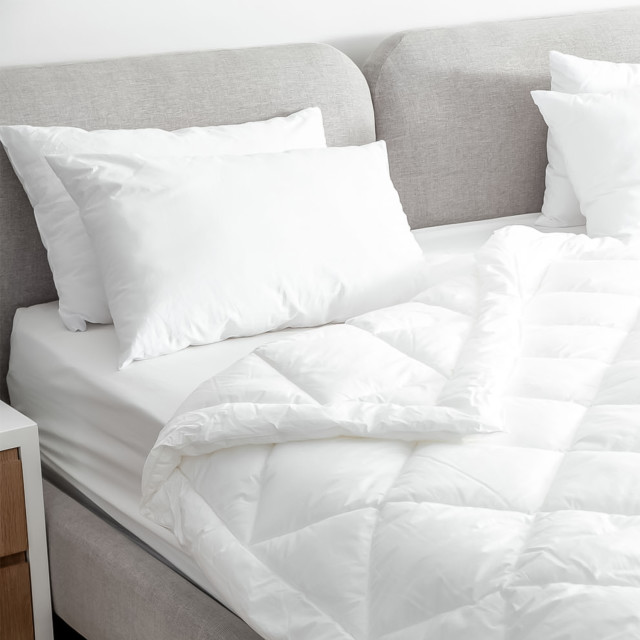 Fine Fibre Premium Medium Firm Pillow on the bed