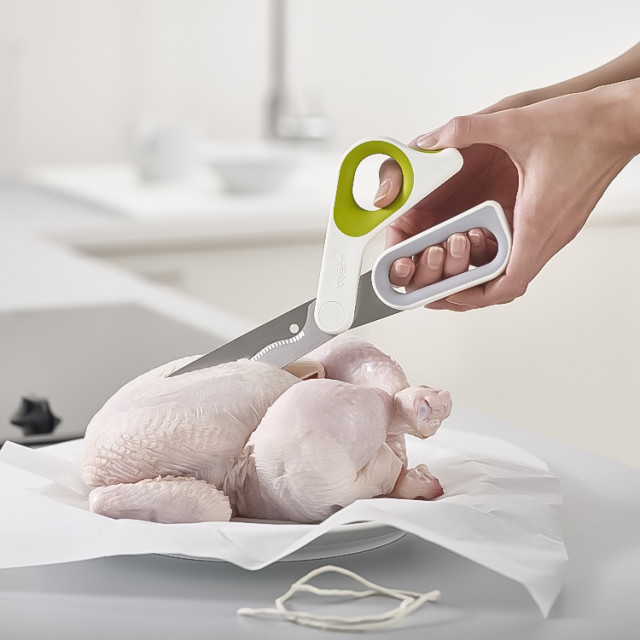 Joseph Joseph PowerGrip Kitchen Scissors cutting chicken