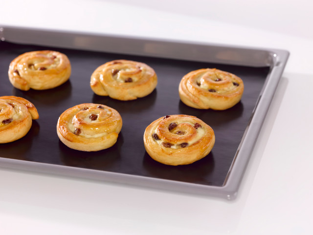 NoStik Reusable Baking Liner, on tray with pastries