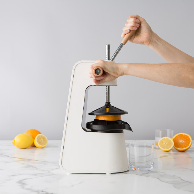 Action image of Chef'n FreshForce Tabletop Citrus Press