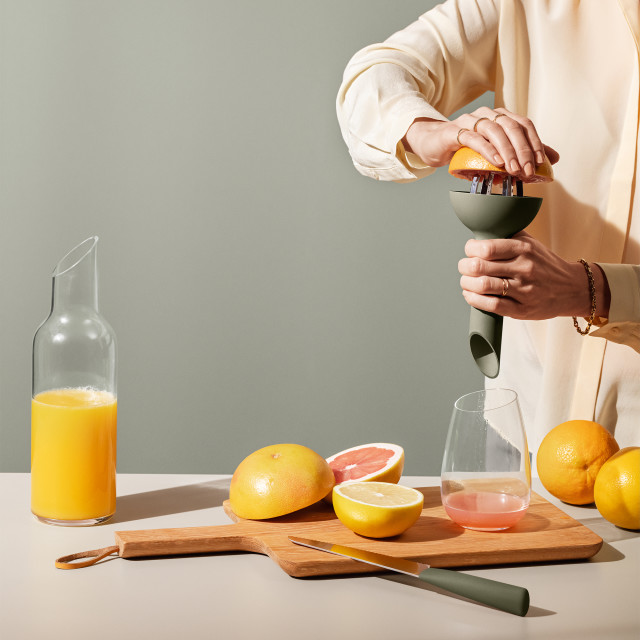 Eva Solo Green Tool Citrus Press with a grapefruit