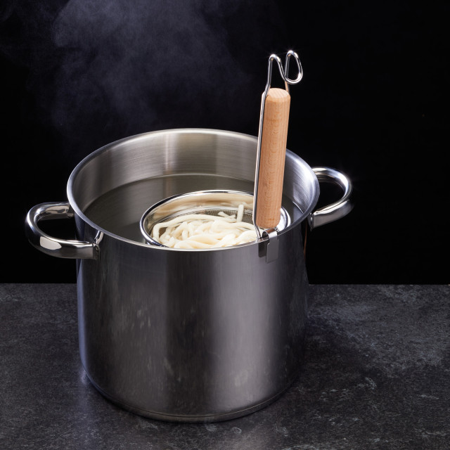 Lifestyle image of KitchenCraft World of Flavours Traditional Noodle Strainer